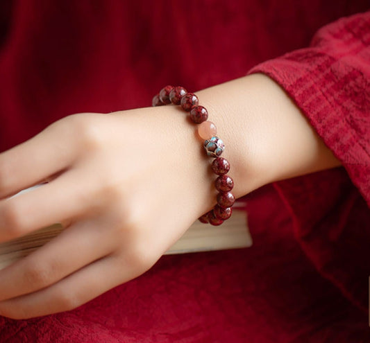 Cinnabar Bracelet with Sunstone and Lotus Flower – A Symbol of Good Fortune and Luck